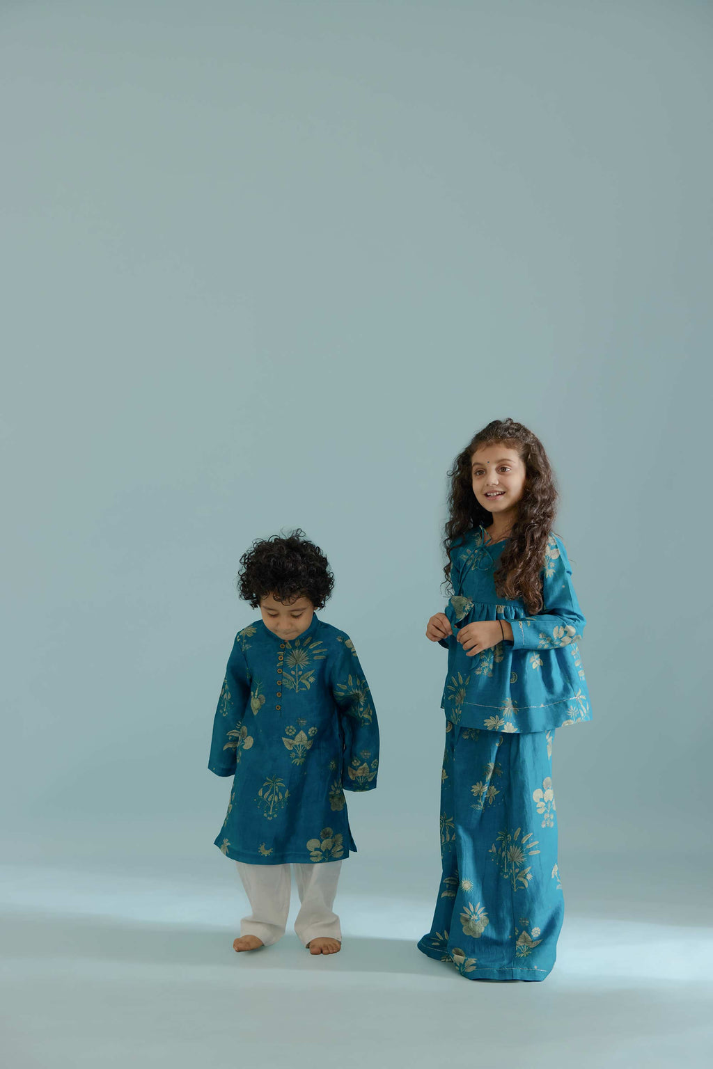 Peacock Sago Peplum Set