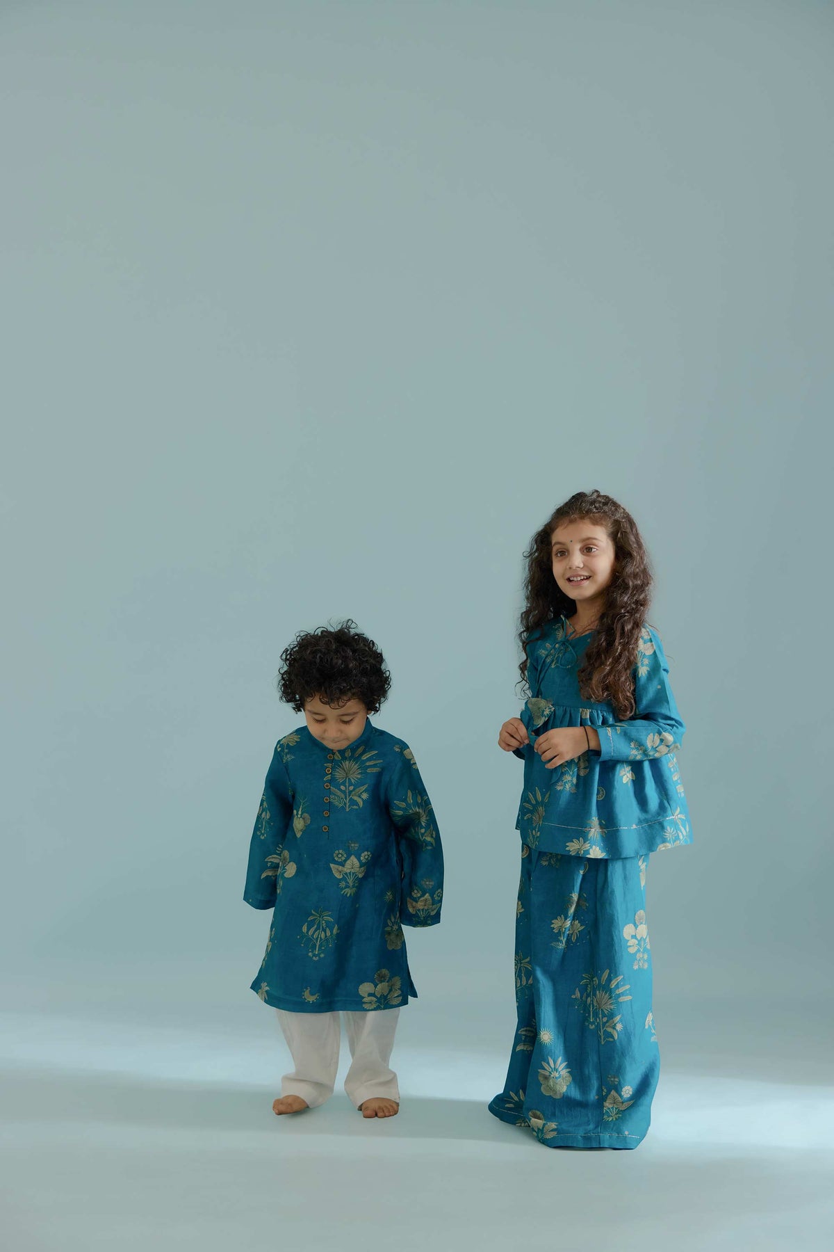Peacock Sago Peplum Set